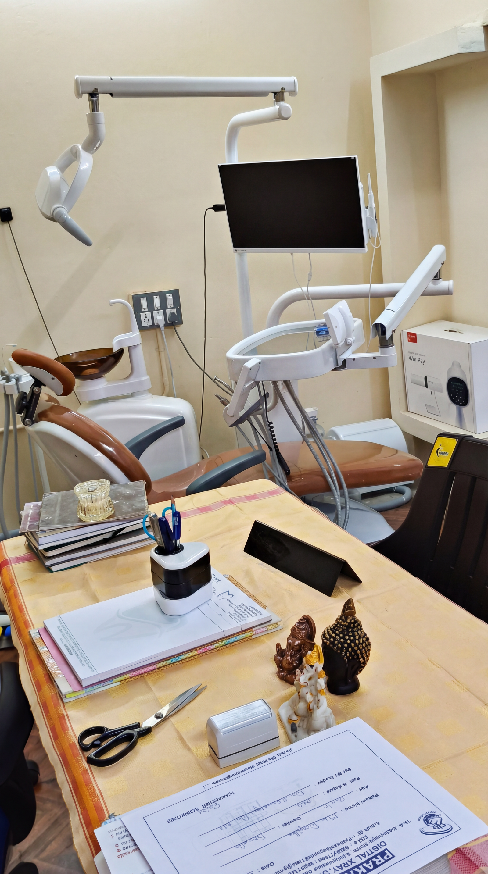 Modern dental treatment chair with advanced equipment at Ram Nila Clinic Panruti